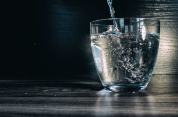 Water flows into the glass